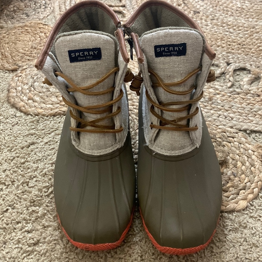 Sperry boots. Cream and tan color with coral on the bottom. Size 11.